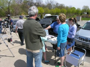 Jim showing his meteorite collection to visitors.