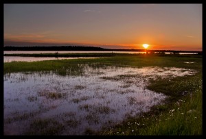 Watching the sunset over St. Mary River, while waiting for a dark sky.