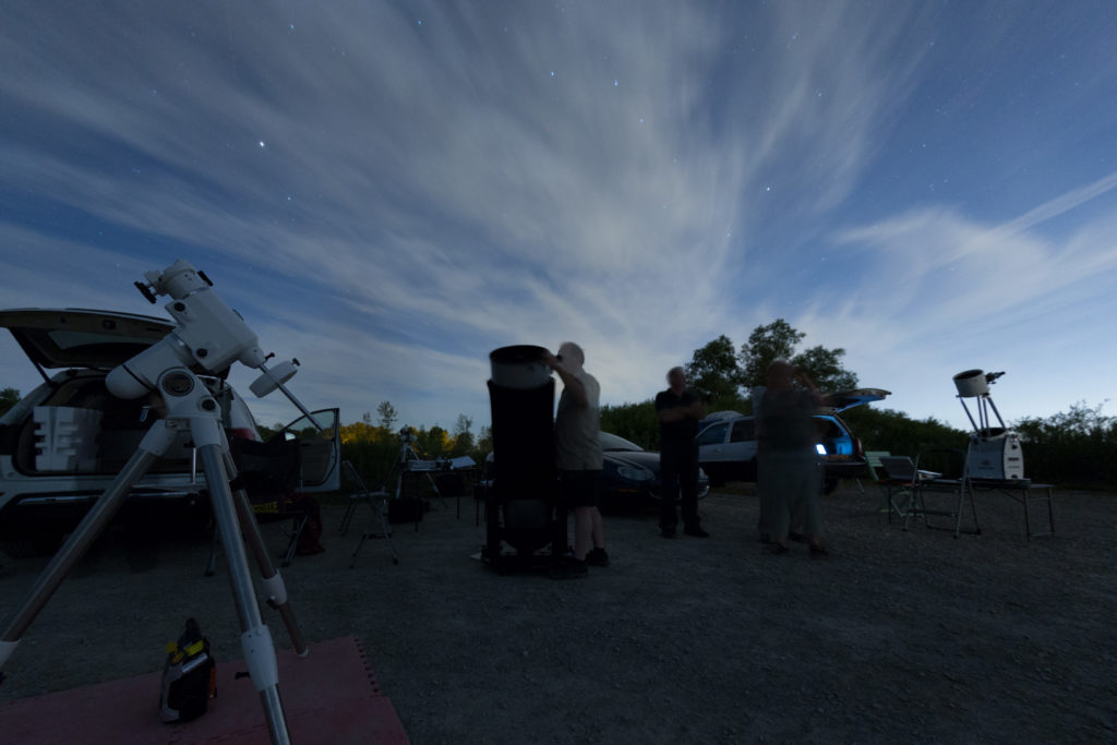 An EQ6 Mount, 12" Dobsonian and a LightBridge Dobsonian.